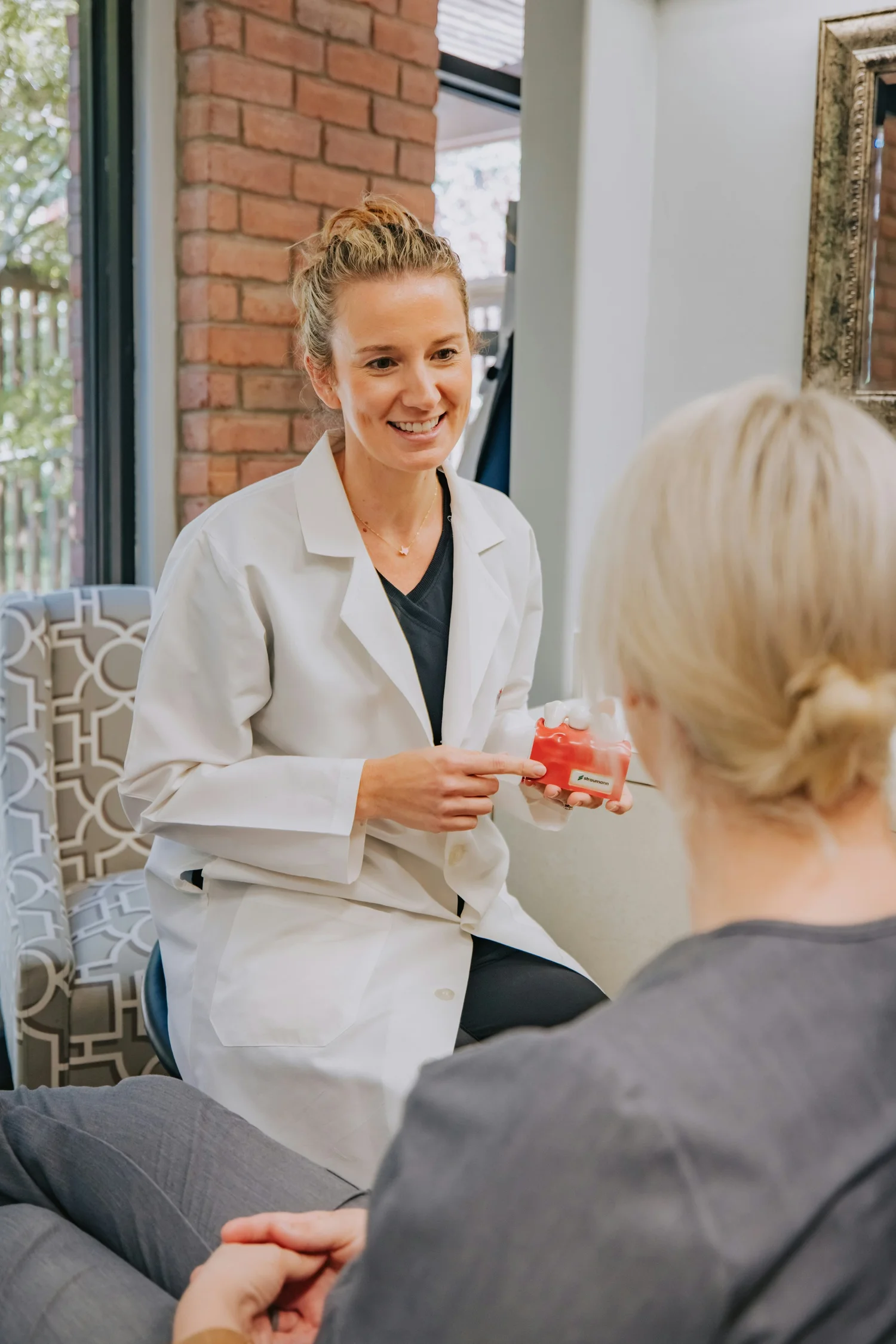 A clinician discussing care with a patient